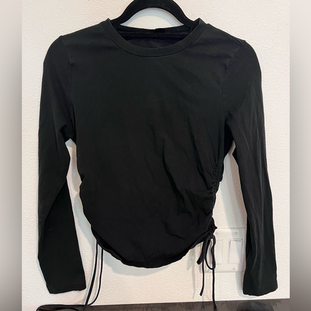 Black drawstring long sleeve t shirt. Black long sleeve top with tie detail